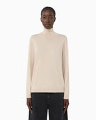 Front view of beige silk and wool turtleneck jumper by Weekend Max Mara