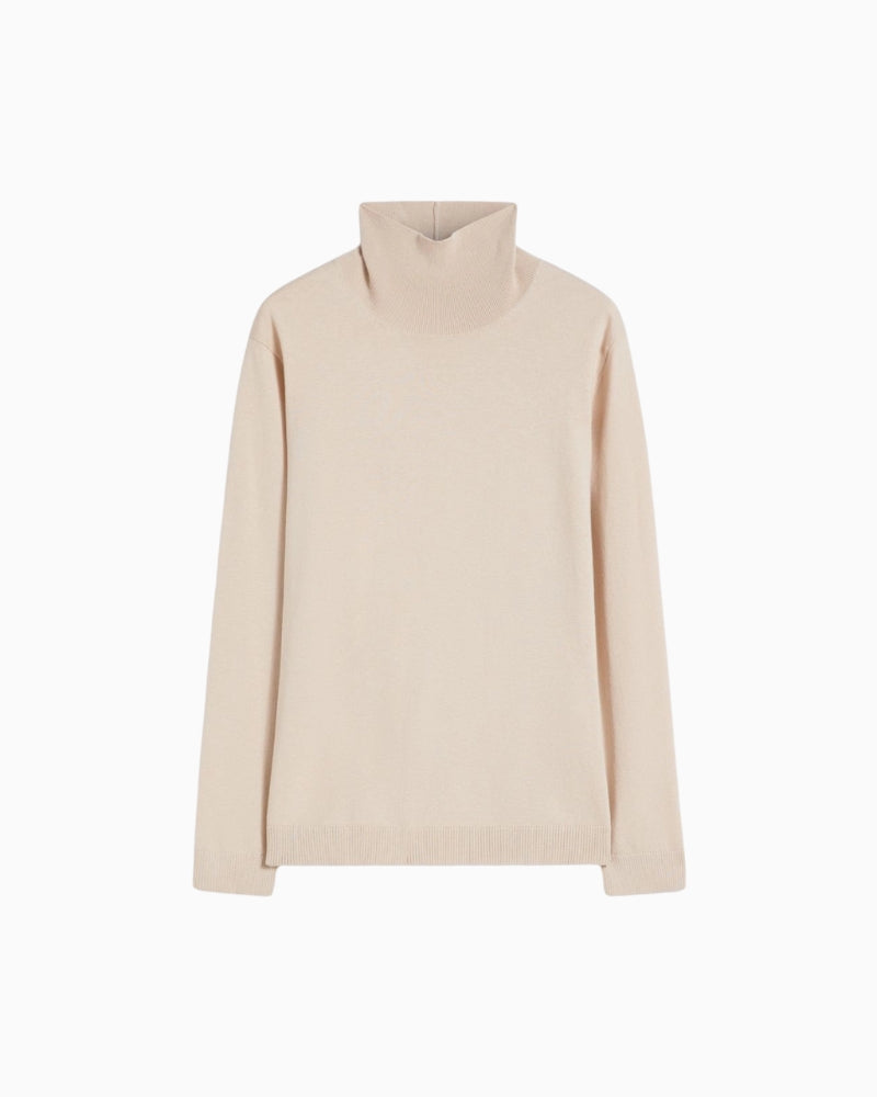 Flat lay of beige turtleneck jumper with ribbed trim