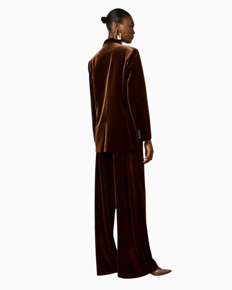 Back view of choco velvet jacket with clean seam detailing