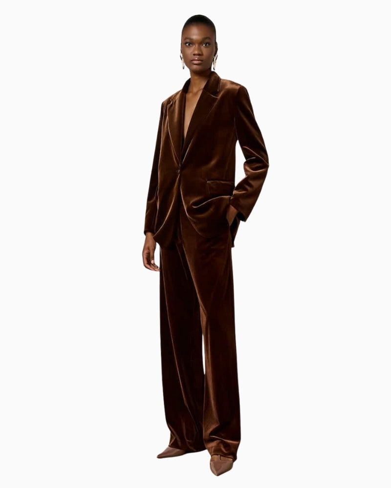 Model wearing jacket with matching trousers for a full velvet look