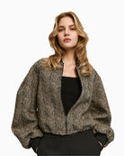 Beige cropped herringbone bomber jacket by Access Fashion with ribbed cuffs and zip front