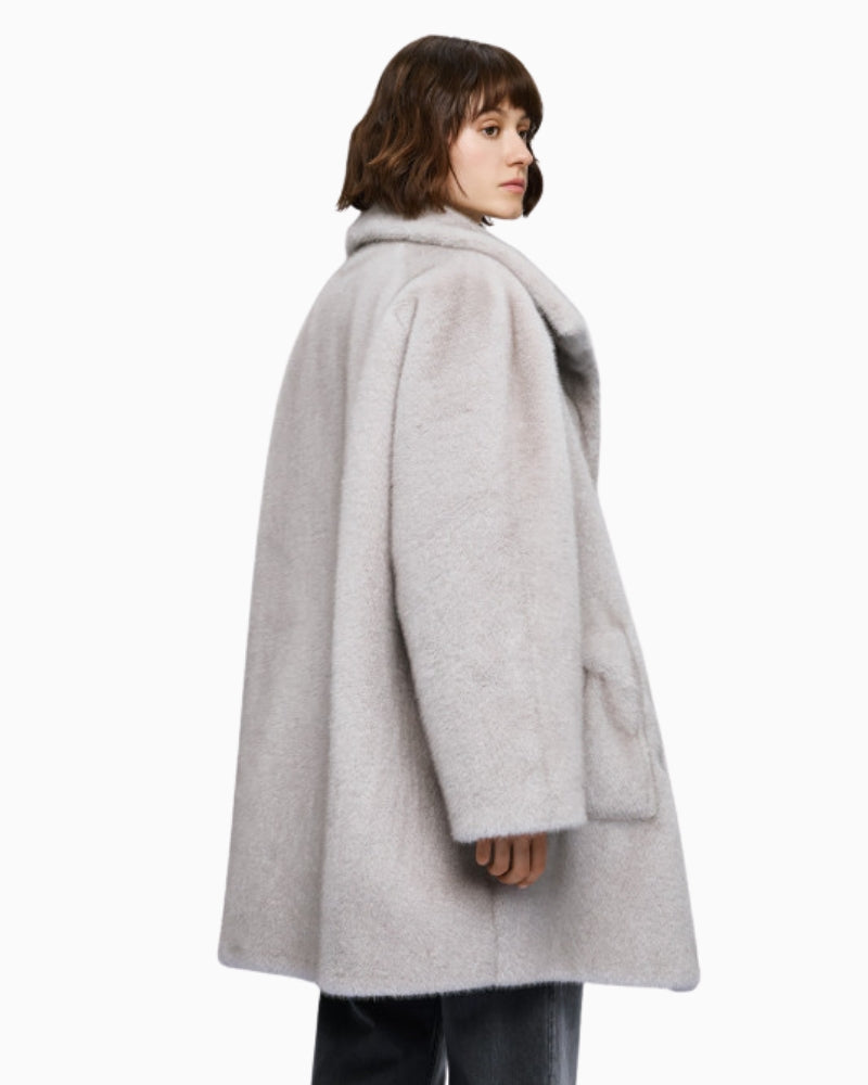 Back view showing longline cut and soft texture