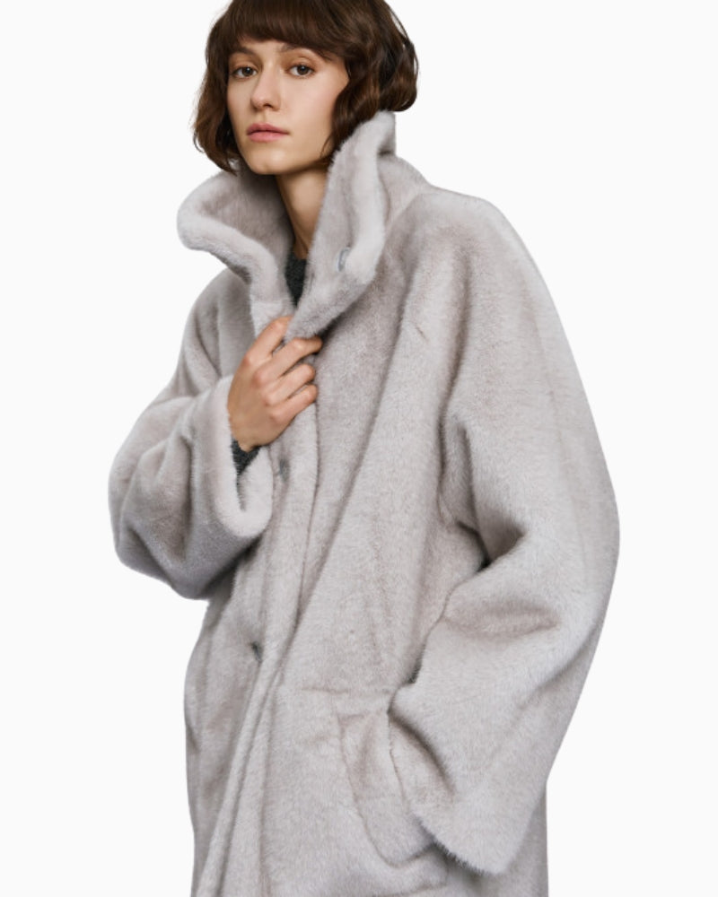 Jacket detail showing buttons and side pocket placement