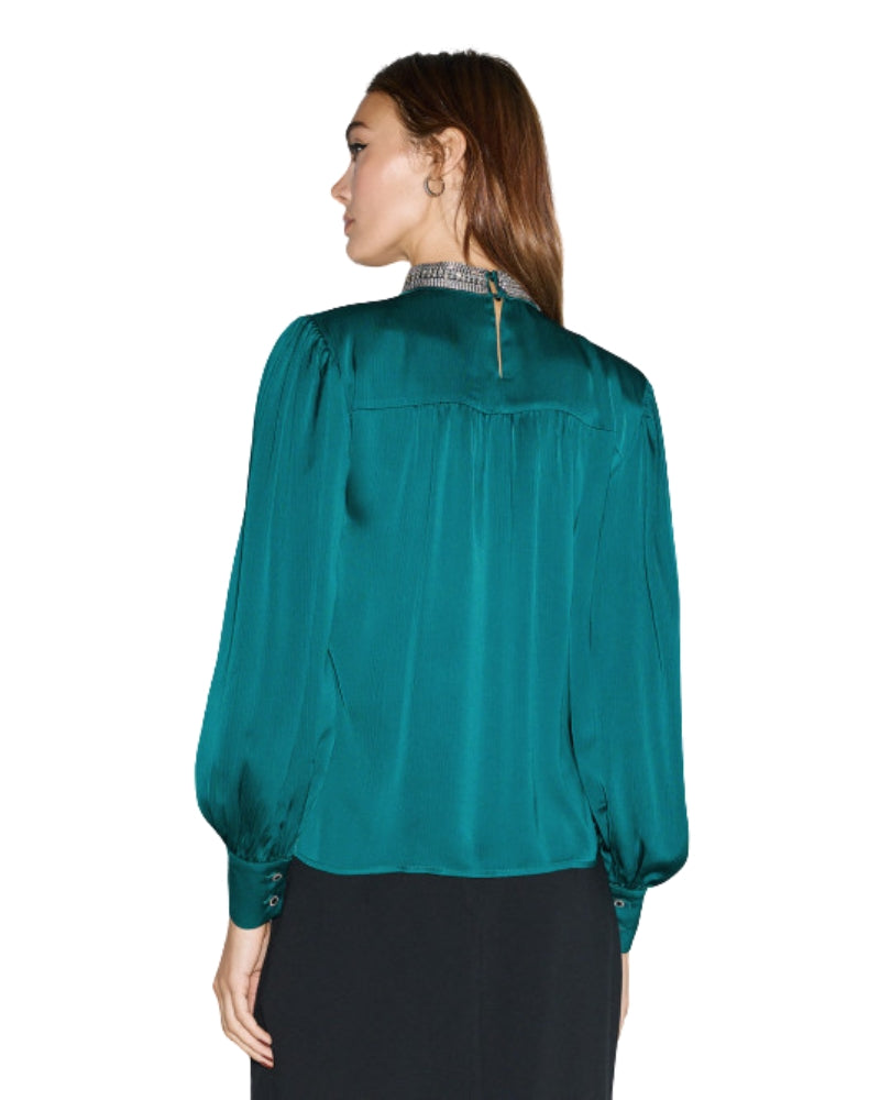 Back view of blouse with button fastening and subtle sheen