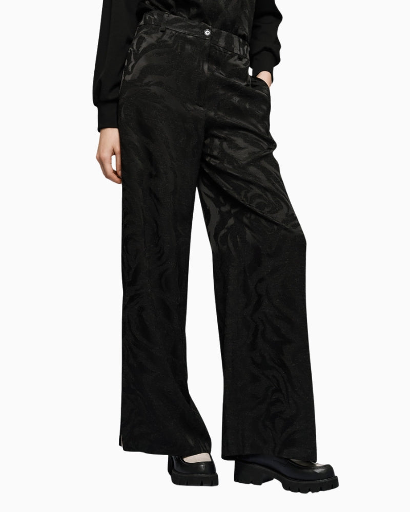 Front view of black high-waist jacquard trousers with side pockets