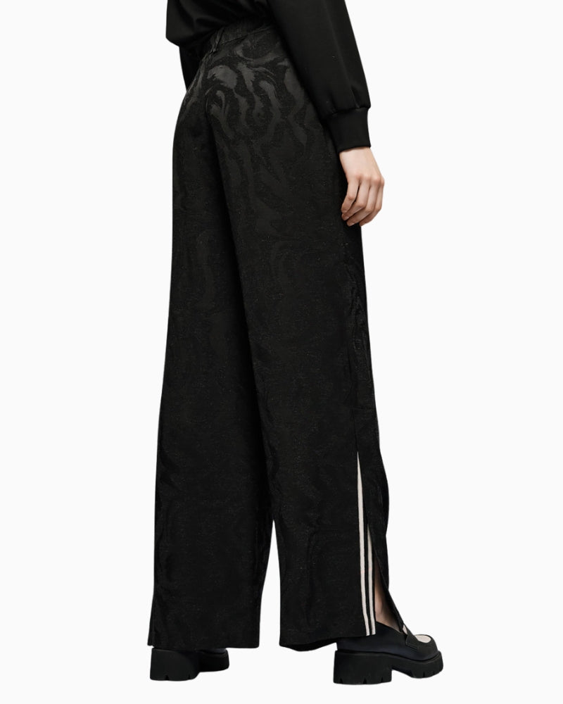 Back view of black trousers by Access with elastic waistband and belt loops