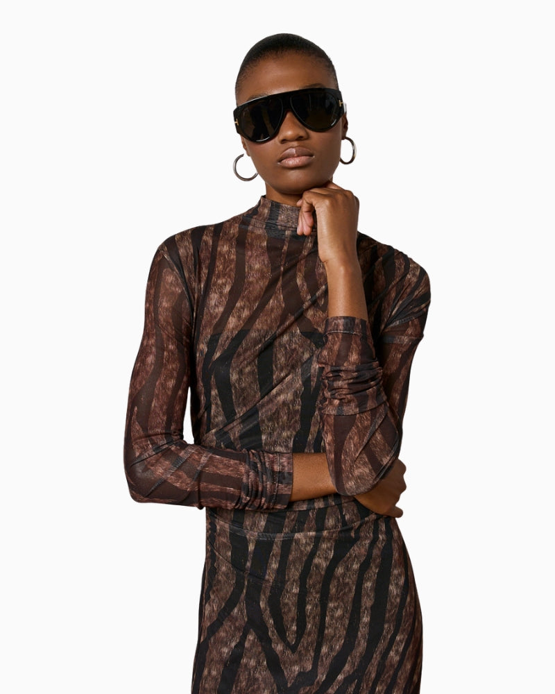 Close-up of ruching and print detail on tulle midi dress