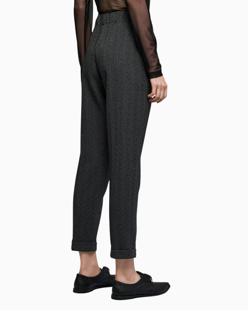 Back view of dark grey pants with elastic waistband and neat finish