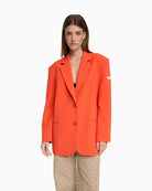 Alix The Label oversized orange blazer with logo print on sleeve and back