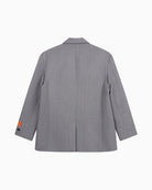 Back view of Alix oversized grey blazer in mélange suiting fabric