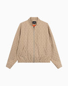 Front view of Alix oversized jacket in camel with zip closure and pockets