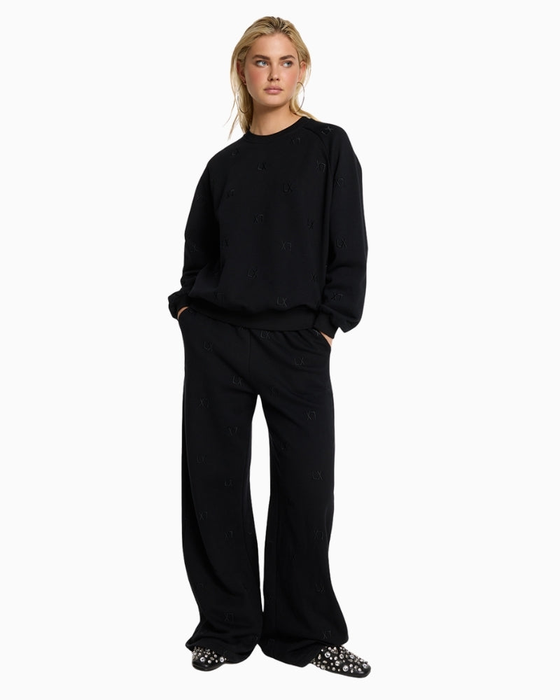Alix The Label black sweatpants with wide leg and LX embroidery