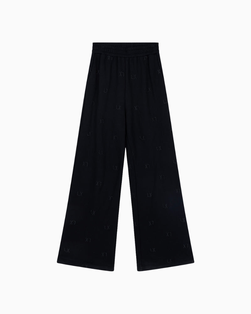 Front view of cotton joggers with elastic waistband and side pockets