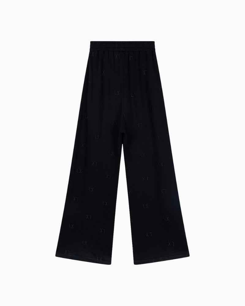 Back view of black Alix joggers in cotton sweat fabric