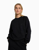 Alix The Label black cotton sweater with round neckline and relaxed fit