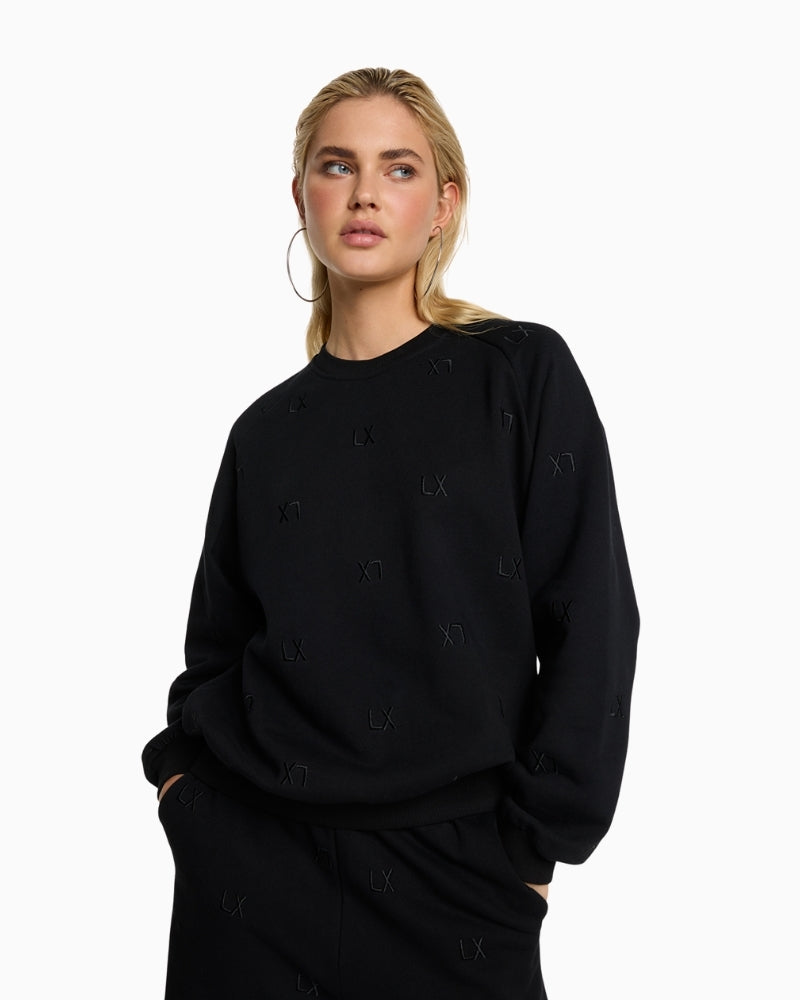 Alix The Label black cotton sweater with round neckline and relaxed fit