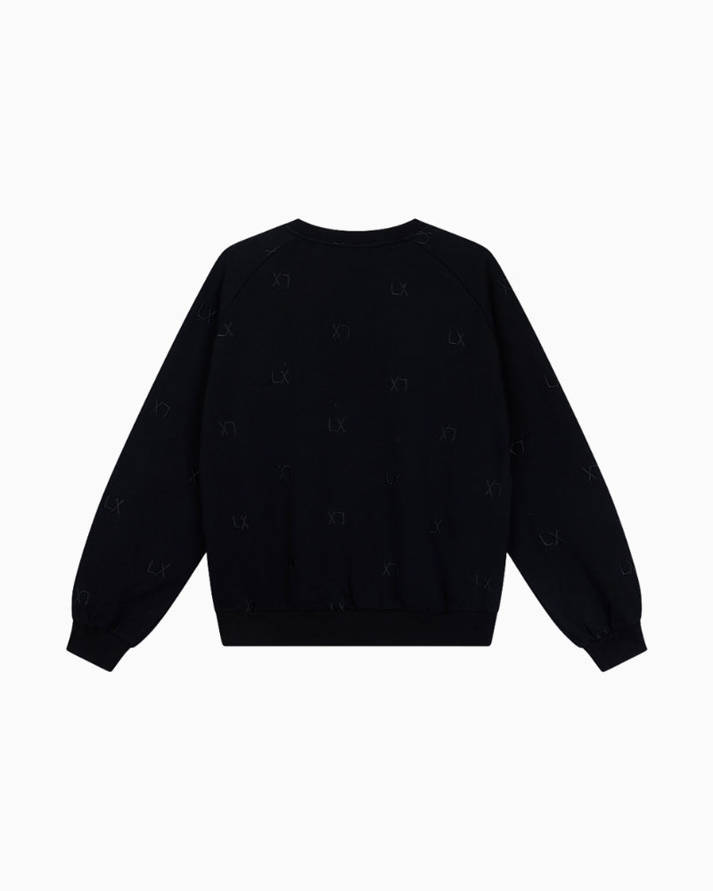 Back view of Alix The Label sweater highlighting clean finish and relaxed shape