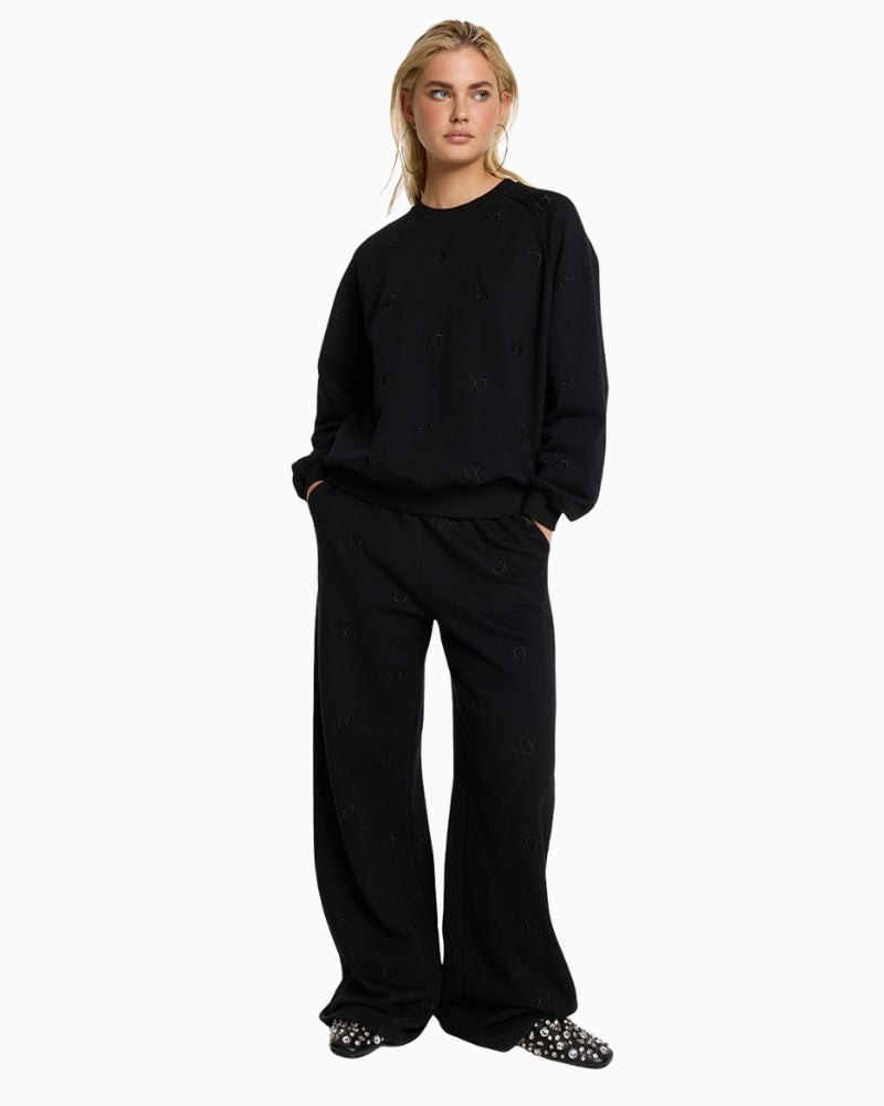 Alix The Label black cotton sweater with round neckline and relaxed fit