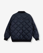 Back view of oversized ALIX bomber showing logo detail and hip-length fit