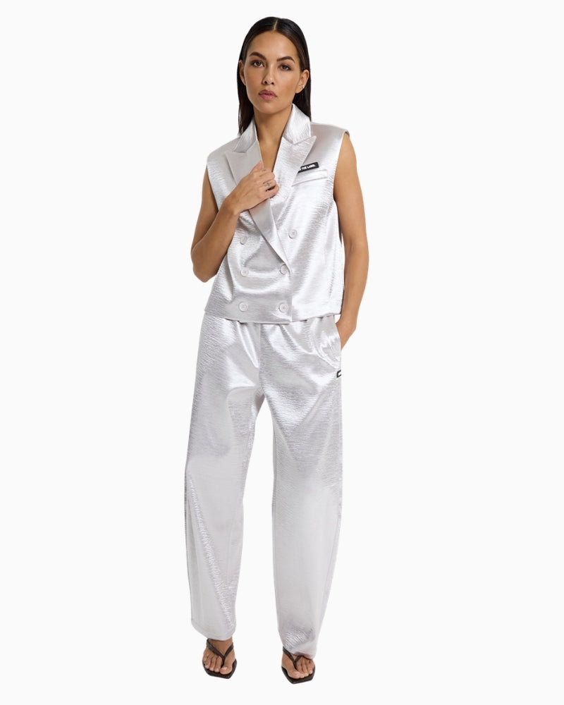 Woman wearing Alix The Label shiny barrel pants silver – Áines Boutique