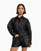 Black satin cropped blouse by ALIX The Label with all-over studs and chest pocket