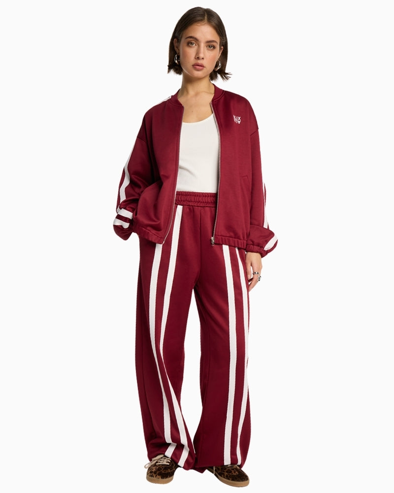 Alix The Label bordeaux sweat pants with wide-leg cut and stripe detail
