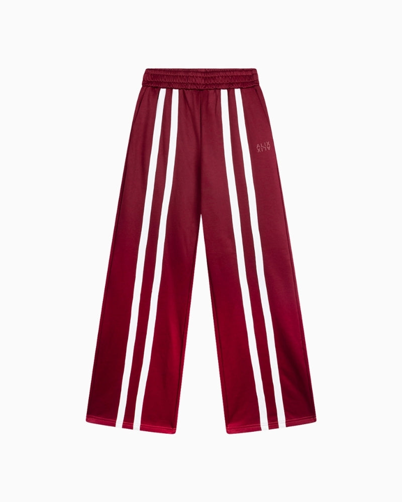 Front view of Alix bordeaux track pants with elastic waistband and pockets