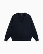 Front view of Alix relaxed fit black V-neck sweater with long sleeves