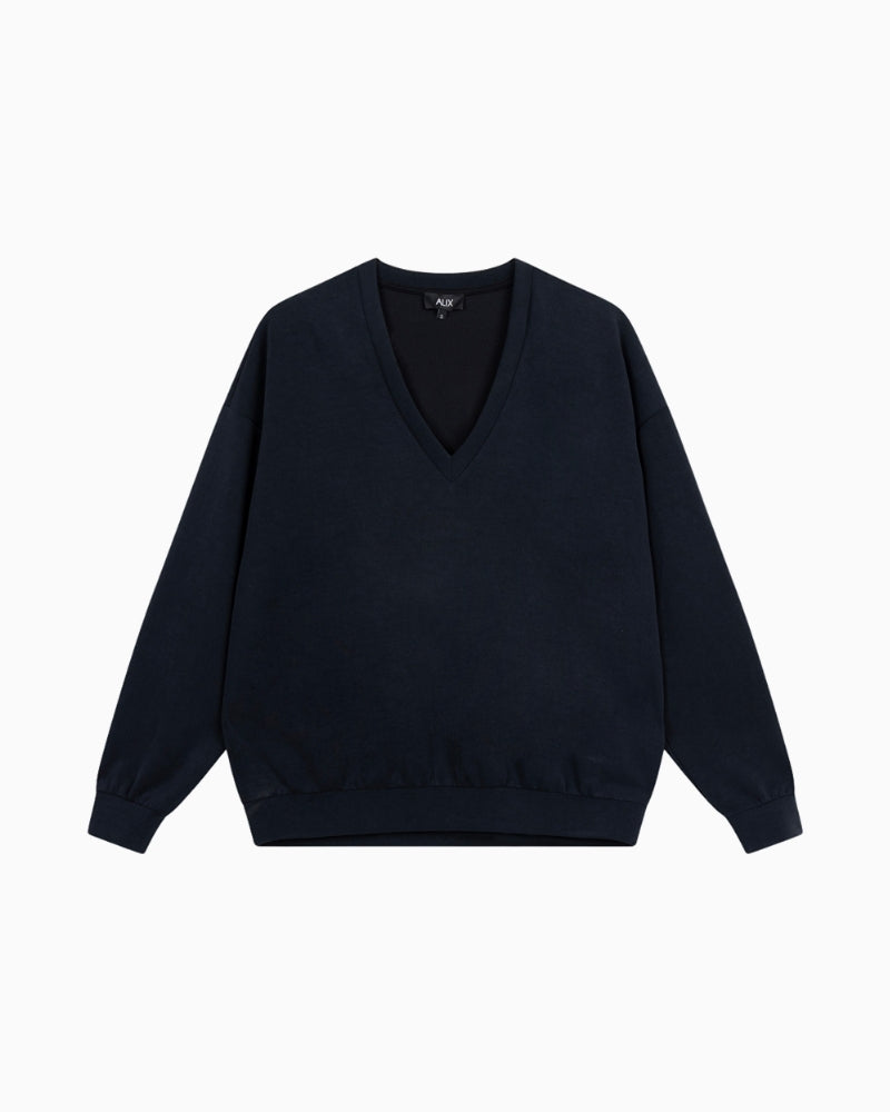 Front view of Alix relaxed fit black V-neck sweater with long sleeves