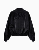 Back of ALIX bomber jacket featuring mirrored ALIX logo and cracked leather texture