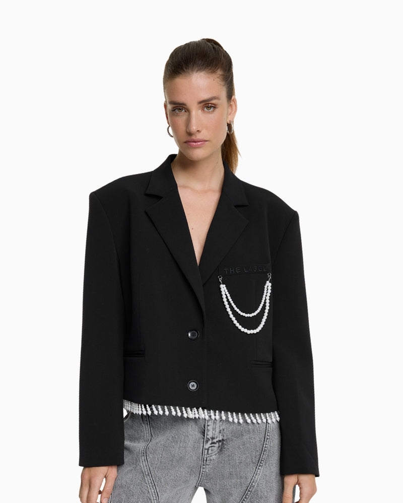 Black cropped blazer with pearl trim at hem and detachable pearl detail by ALIX The Label