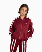 Bordeaux cropped sweat jacket by ALIX The Label with front zip and round neckline