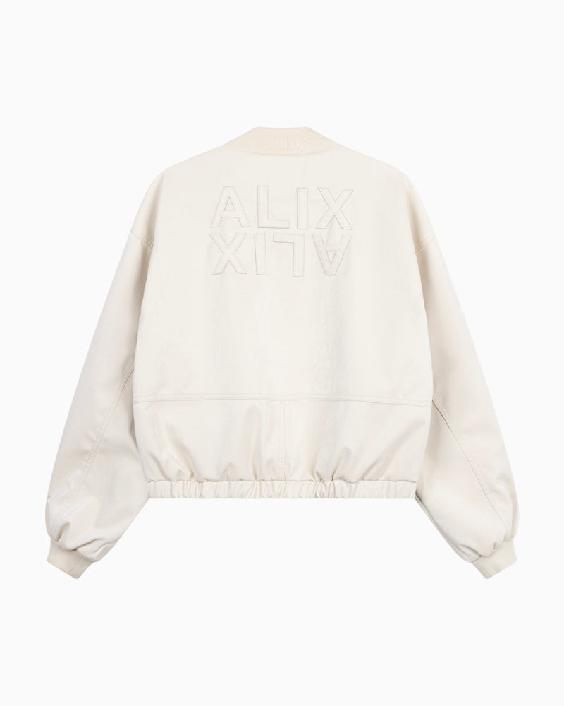 Back view of ALIX bomber showing mirrored logo and cracked leather texture