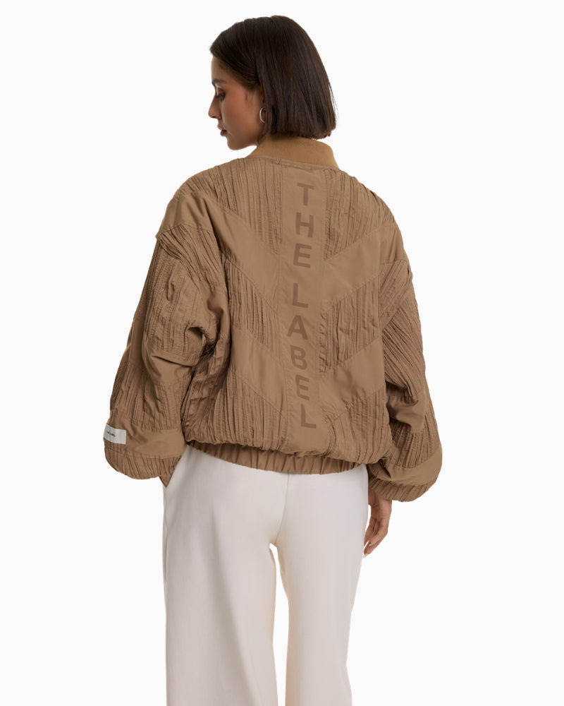 Alix The Label Plissé Bomber camel back view with artwork