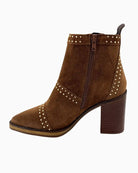 Side view showing 9cm block heel and studded suede detailing