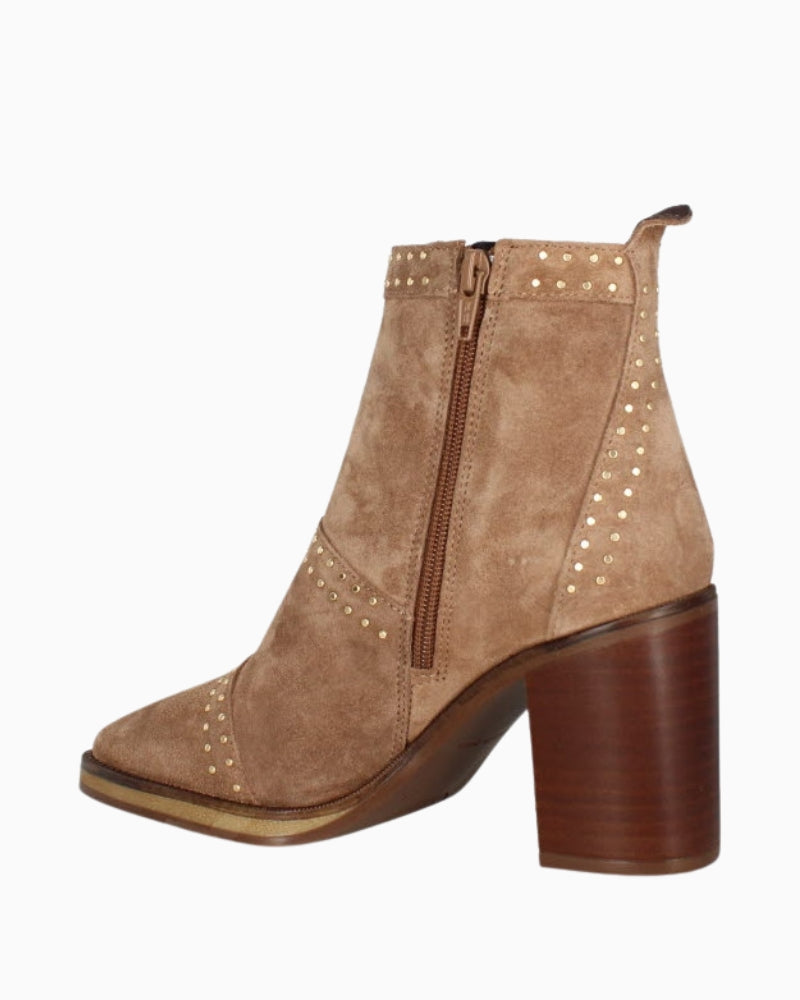 Close-up of suede texture and fleece-lined interior