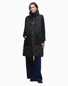 Black quilted Barbour Bernice gilet with teddy collar and tartan lining
