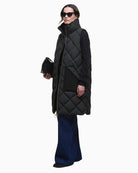 Black quilted Barbour Bernice gilet with teddy collar and tartan lining