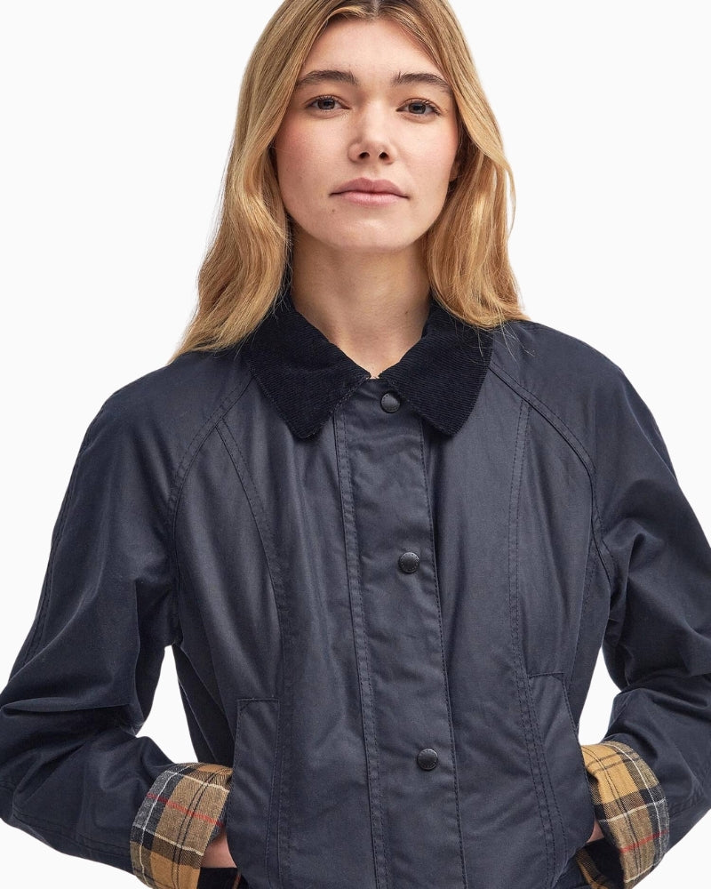 Barbour Beadnell Waxed Jacket in navy button detail