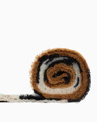 Rolled beige Barbour scarf with woven brand label