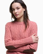 Side angle showing the cable-knit texture and fit of the jumper