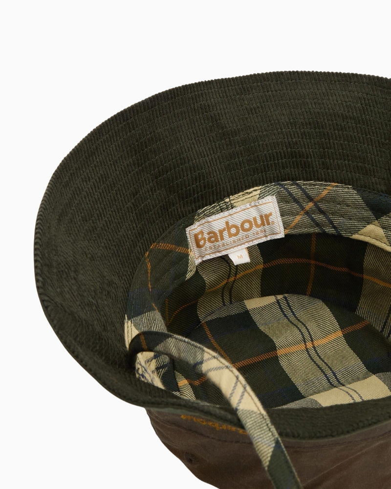 Inside tartan lining of Barbour Brackley Waxed Bucket Hat in cotton