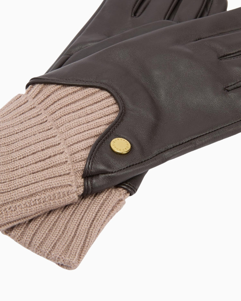 Side view of Barbour leather gloves with branded rivet detail