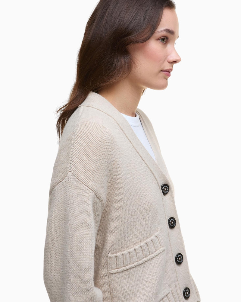Side view of Barbour Faye cardigan showing cropped length and chunky knit texture