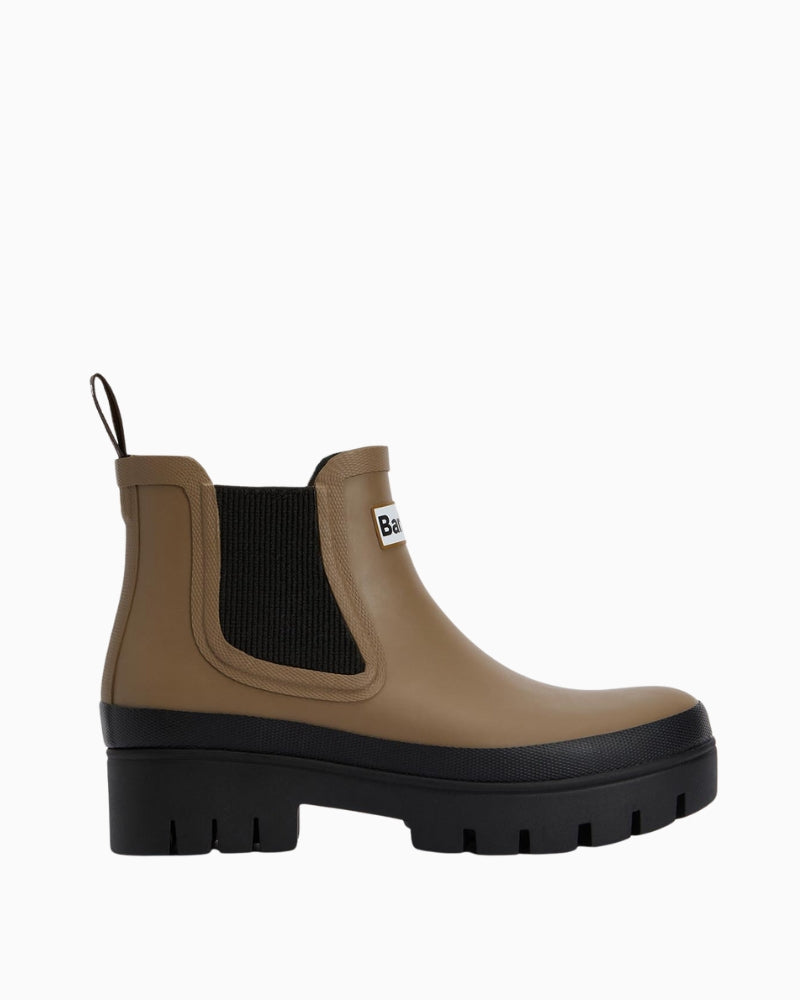 Side view of Barbour Halton ankle wellies in black with chunky lug sole and sleek rubber finish