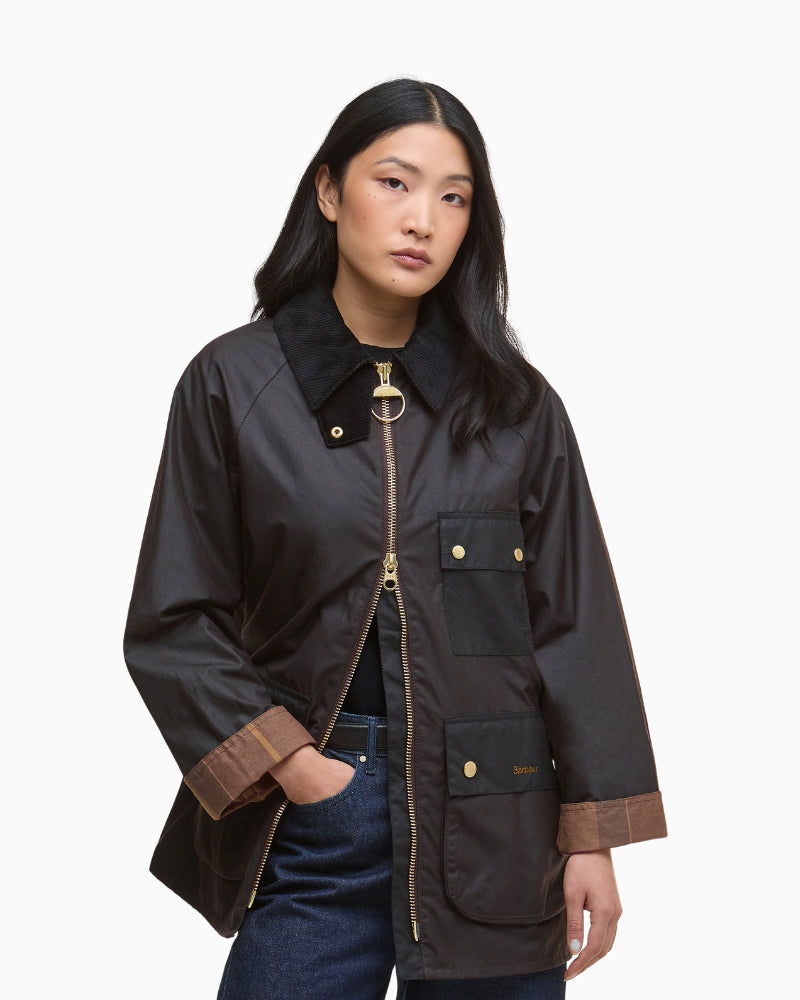 Barbour Luella Wax Jacket in black with gold zip and corduroy collar