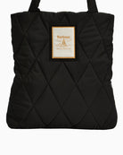 Close-up of Barbour Mariah Quilted Tote Bag logo patch and diamond stitching detail