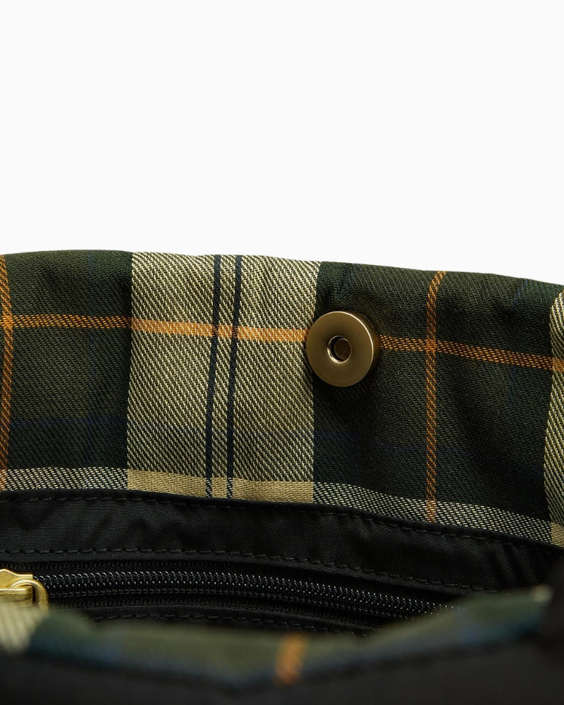 Closed-up view showing tartan inner lining of Barbour Mariah Quilted Tote Bag