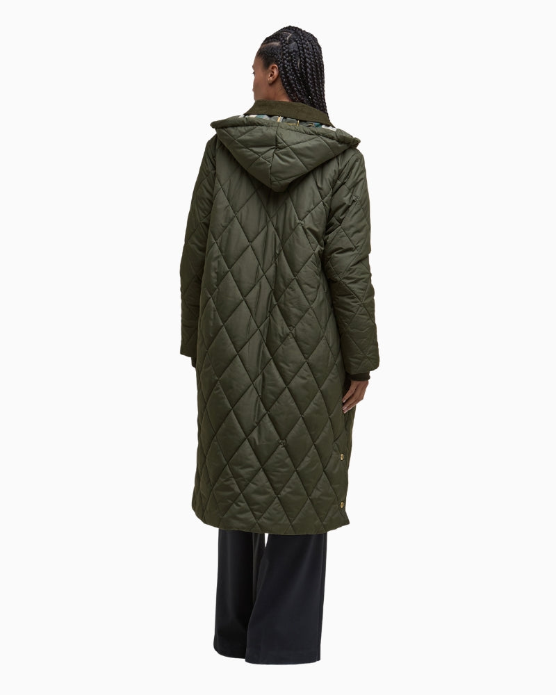Back view showing fitted silhouette and quilted texture