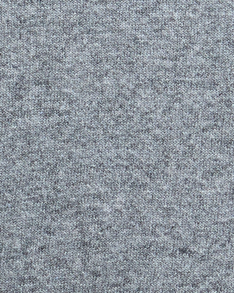 Fabric close-up of soft grey marl wool-cotton blend with visible knit texture